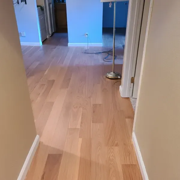 Light natural hardwood floor in a hallway in the East Bay