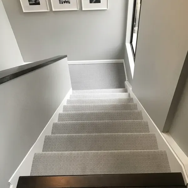 Patterned gray carpet on a staircase in the East Bay